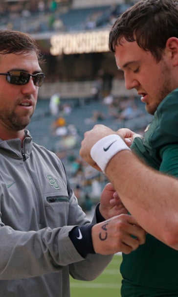 Russell 4 TD passes, No. 23 Baylor rolls 55-7 over Demons